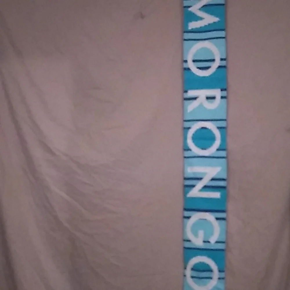 6 x 62 inches including the fringe. Warm winter scarf from Morongo Casino